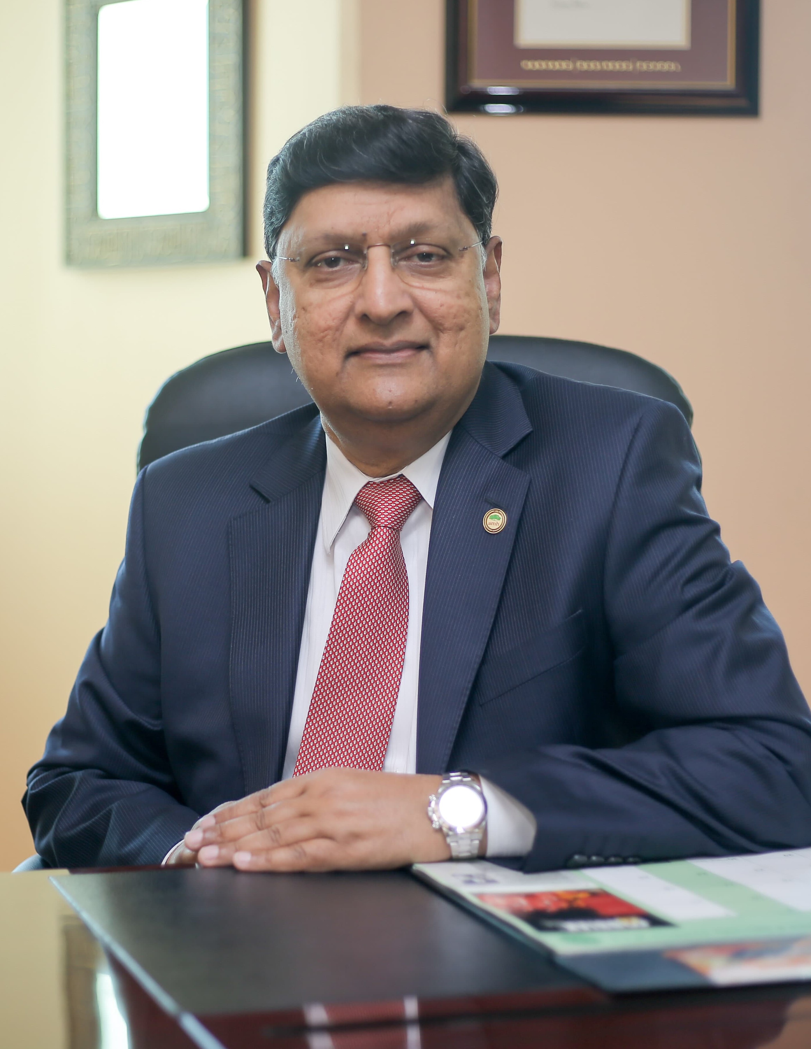 01 Dr George Cheriyan CCEO Cropped at Table.jpg 01 Dr George Cheriyan CCEO Cropped at Table.jpg
